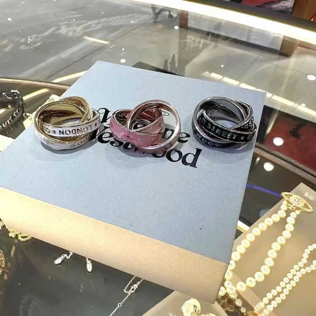 Ontwerper New Westwoods drie ringen verbonden glazuur vallende oliebrief Saturn Ring Dames licht luxe temperament modearmband nagel