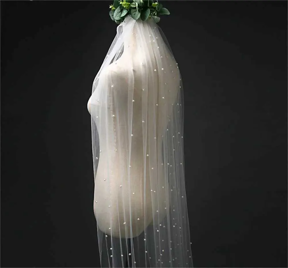 Bruidssluier met parels en kam voor bruiloft kathedraal lengte_voghion.com