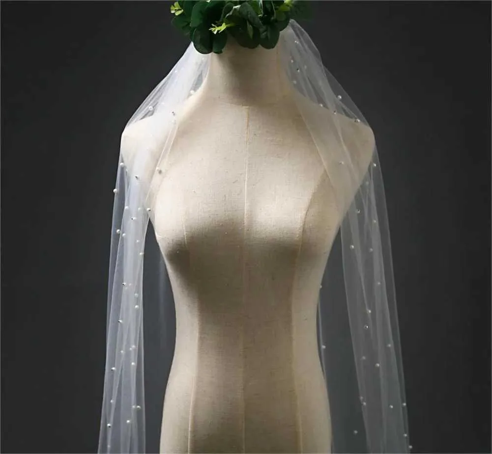 Bruidssluier met parels en kam voor bruiloft kathedraal lengte_voghion.com