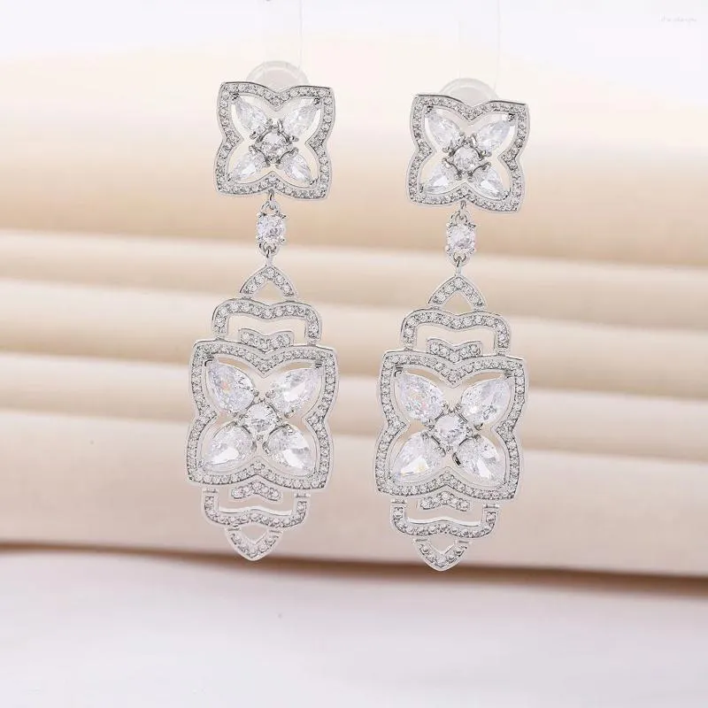 Dangle Earrings Evacandis Floral Design Inlaid Cubic Zirconia drop for Women Stylish White Golden Gemstoneプレミアムファインジュエリー