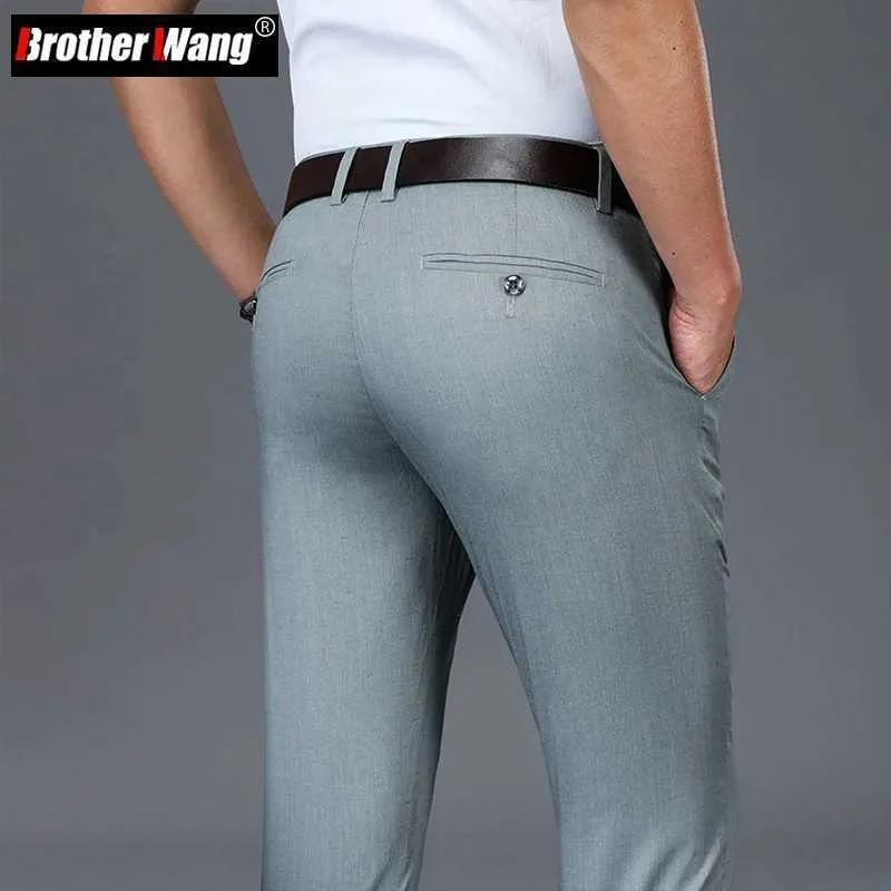 Calças masculinas 2023 Primavera Verão Novo masculino Pontas casuais clássicas estilo modal elegante calça sem ferro acabado de marca masculina roupas de marca y240514