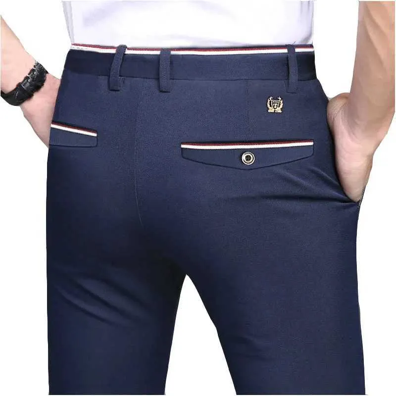 Męskie spodnie męskie spodnie Modne i eleganckie męskie spodnie stałe kolor prosta długość męska Slim FICT Męskie spodnie czarne Y240514
