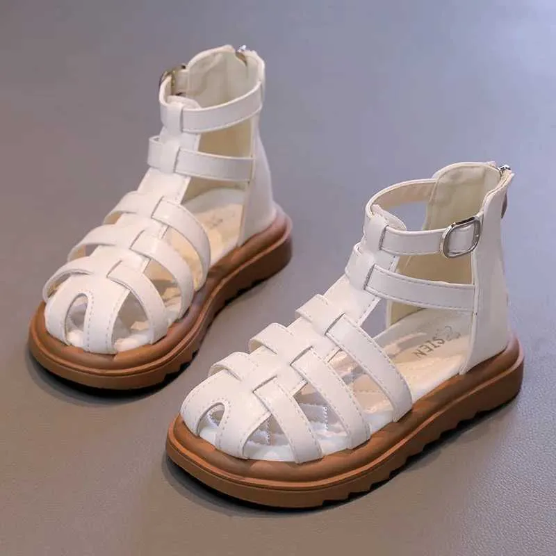 Sandals British style childrens sandals girl 2024 summer childrens hollow beach shoes fashion leather boots girl high-end simple Roman sandals d240515