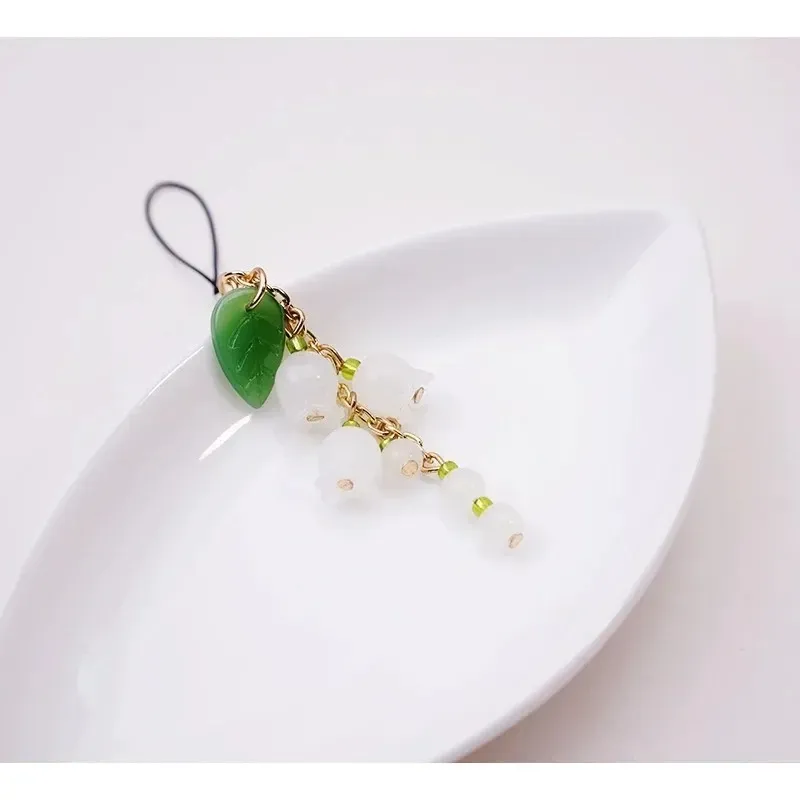 Exquis Lily of the Valley Mobile Phone Lanyard Women Chain Chain Pendant Jade Pendant Petit Accessoires de chaîne de téléphonie mobile