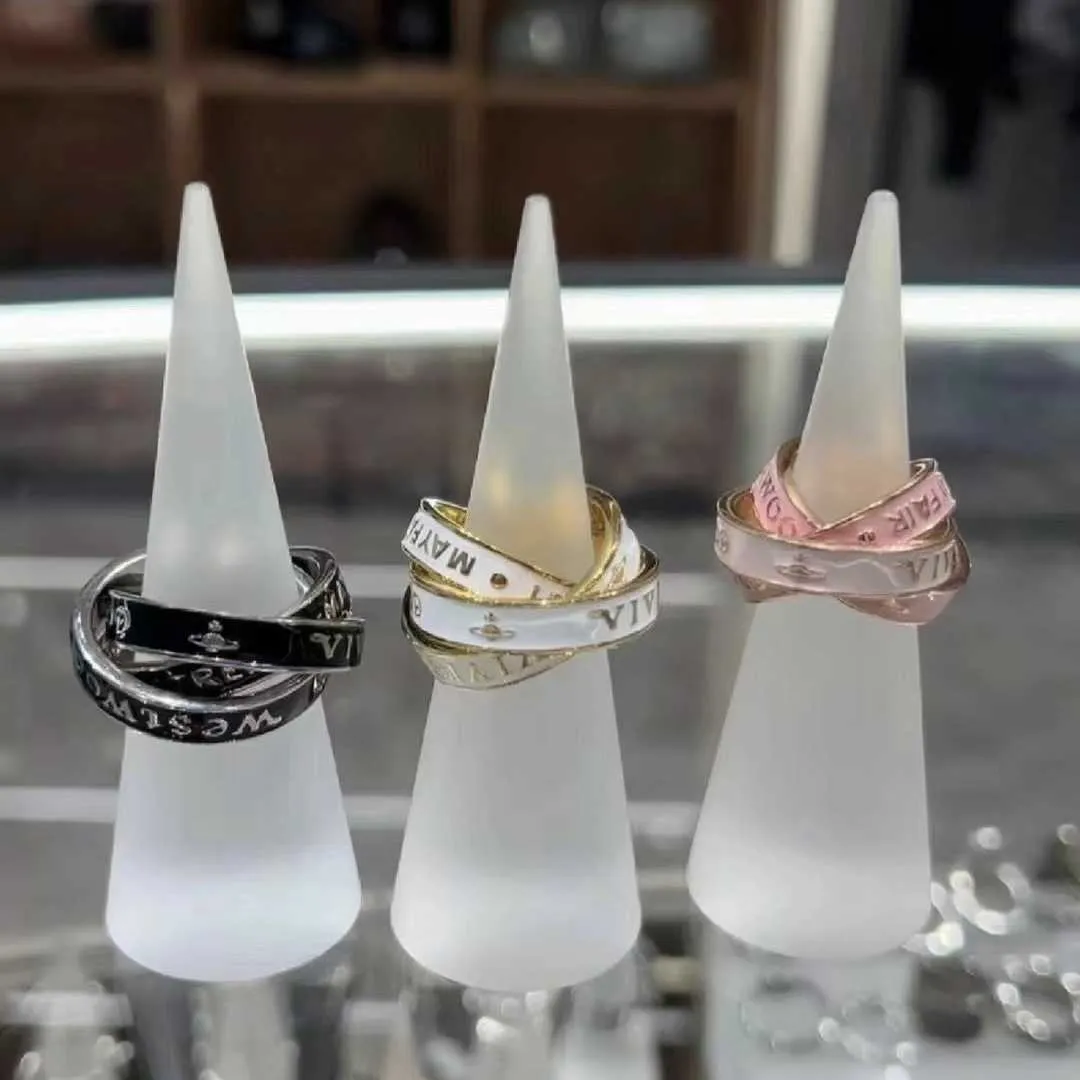 NUOVA ARRIVERSWESTWOODS Tre anelli Ring di smalto femmina Westwoods Fairy Wind Saturno Pink Black and White Nail