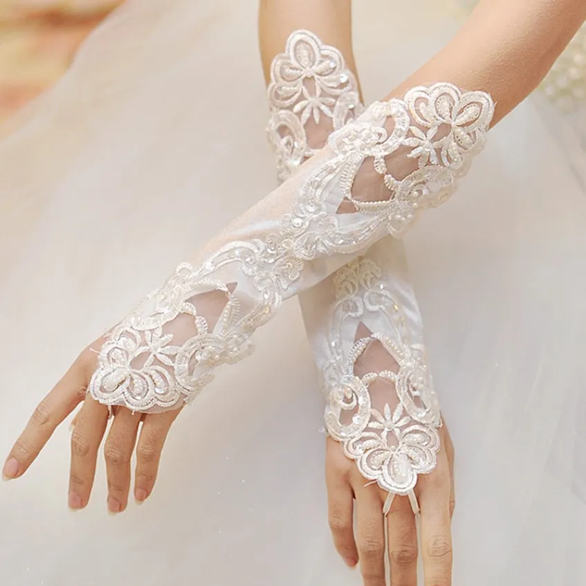 2021 Mooie bruidshandschoenen Witte vingerloze kanten Appliqued Pearl kralen bruidshandschoenen Houdhandschoenen goedkoop EM01467 291N