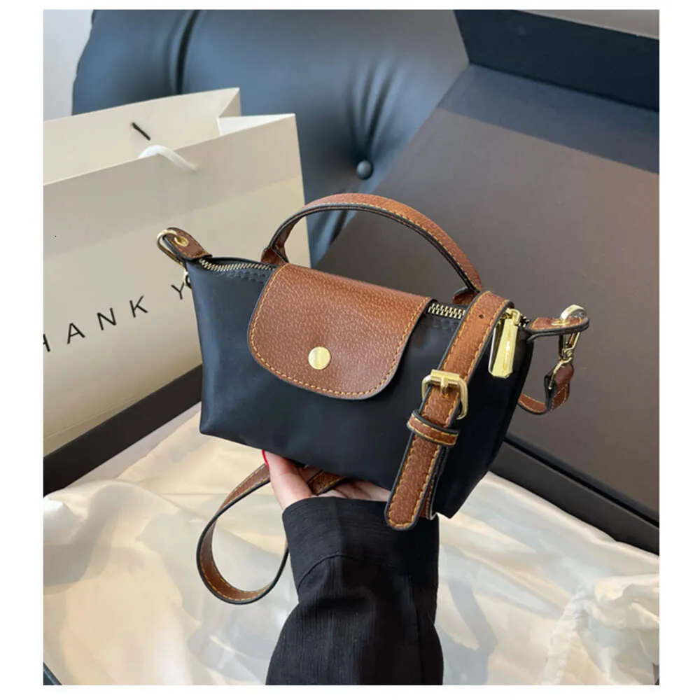 DHgate.com:Longxiang Bun Mini Dumpling Bun Change Phone Bag DHgate.com:Longxiang Bun Mini Dumpling Bun Change Phone Bag