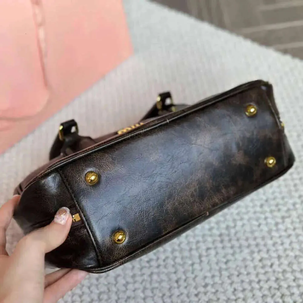 DHgate.com:Miumu Bag Sell Mumu Brown Bowling Bag Women High