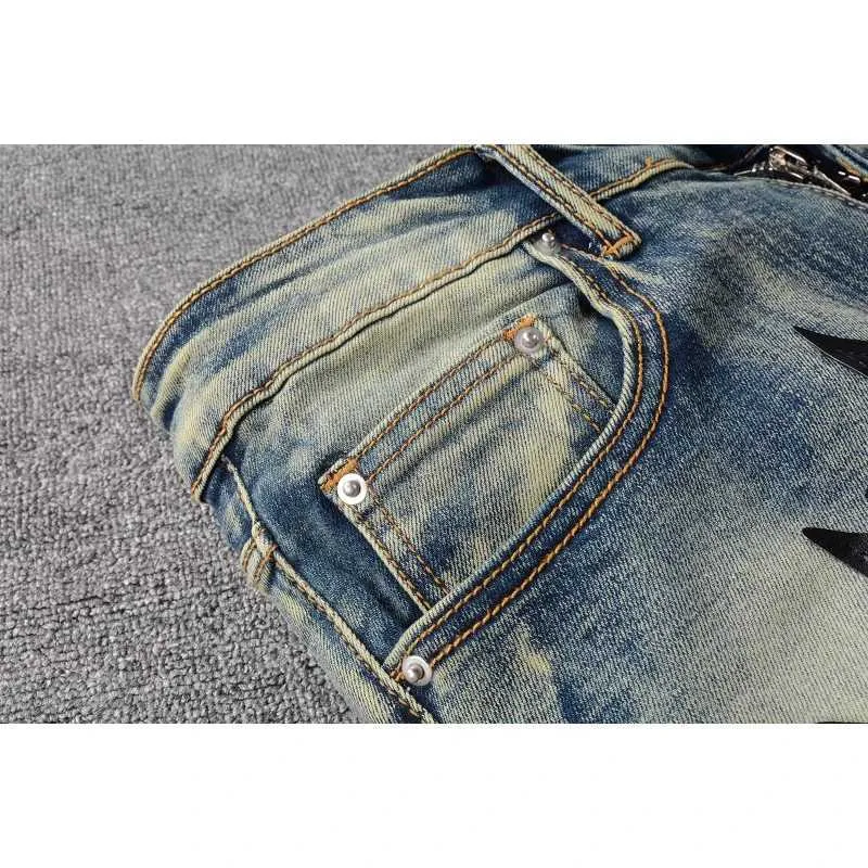 Jeans strappati skinny elasticizzati con fori e patchwork di stelle blu consumate US Drip High Streetwear_voghion.com