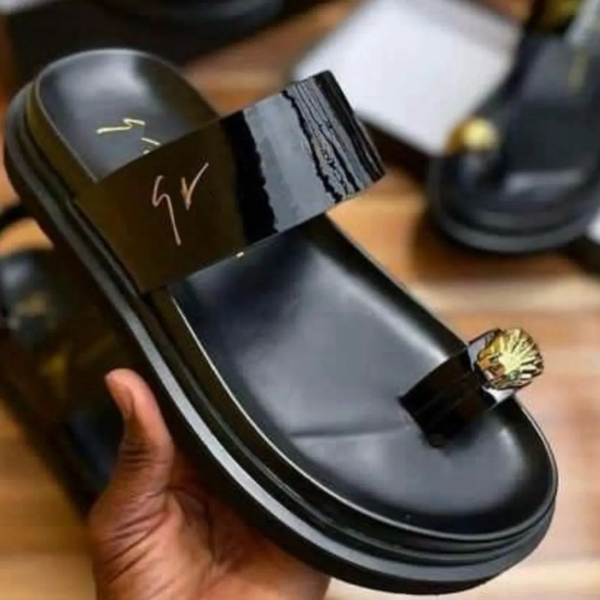 Giuseppe Zanotti leather slide sandals with buckle strap for  display picture 1