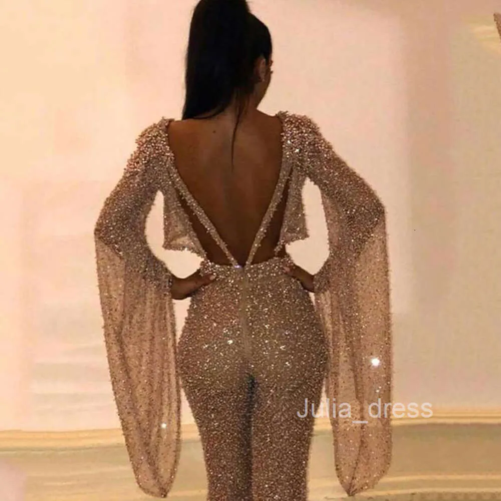 Gold jumpsuit long sleeve store