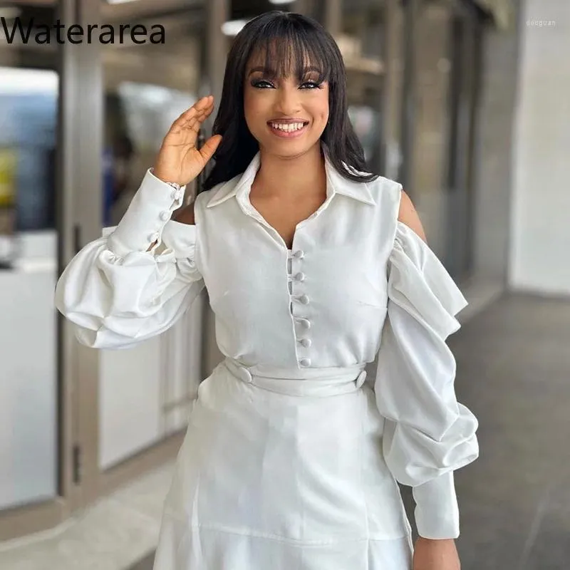 Dresses with big buttons on sale