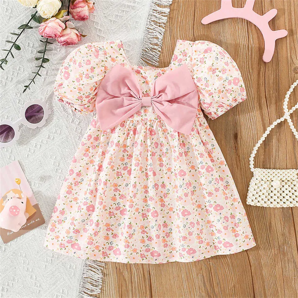 Girl's Infant Dress with Bubble Sleeves and Large Pink Bow Small Fragmented Pink Pattern Summer Baby Dress from Dhgate Girl's Dresses - price 15.92 Girl's Infant Dress with Bubble Sleeves and Large Pink Bow Small Fragmented Pink Pattern Summer Baby Dress from Dhgate Girl's Dresses - price 15.92