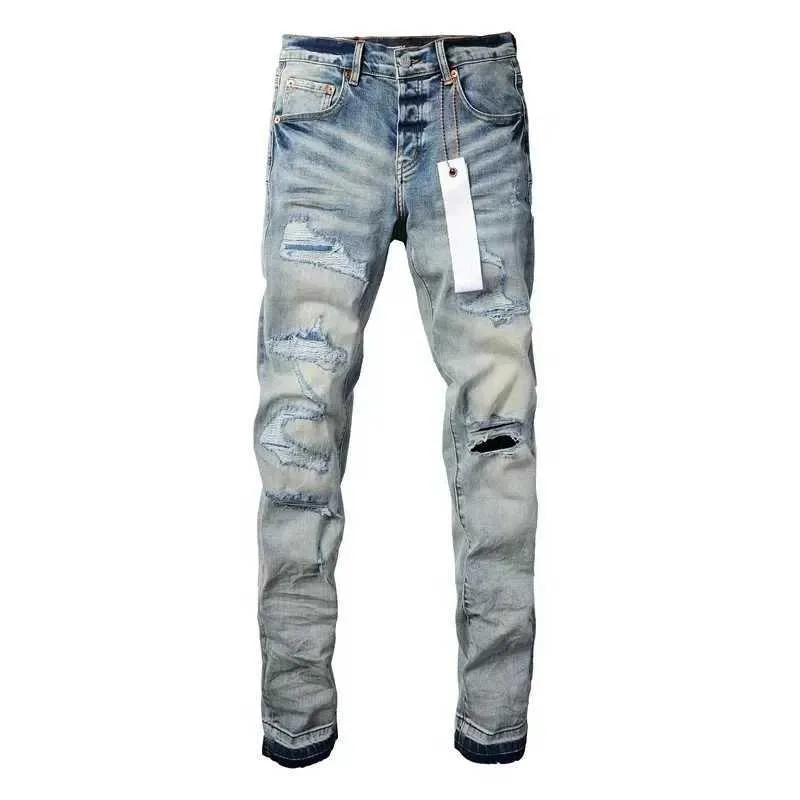 Jeans skinny viola da uomo con strappi e patch effetto usato_voghion.com