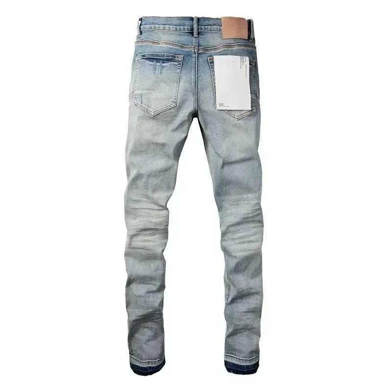 Jeans skinny viola da uomo con strappi e patch effetto usato_voghion.com