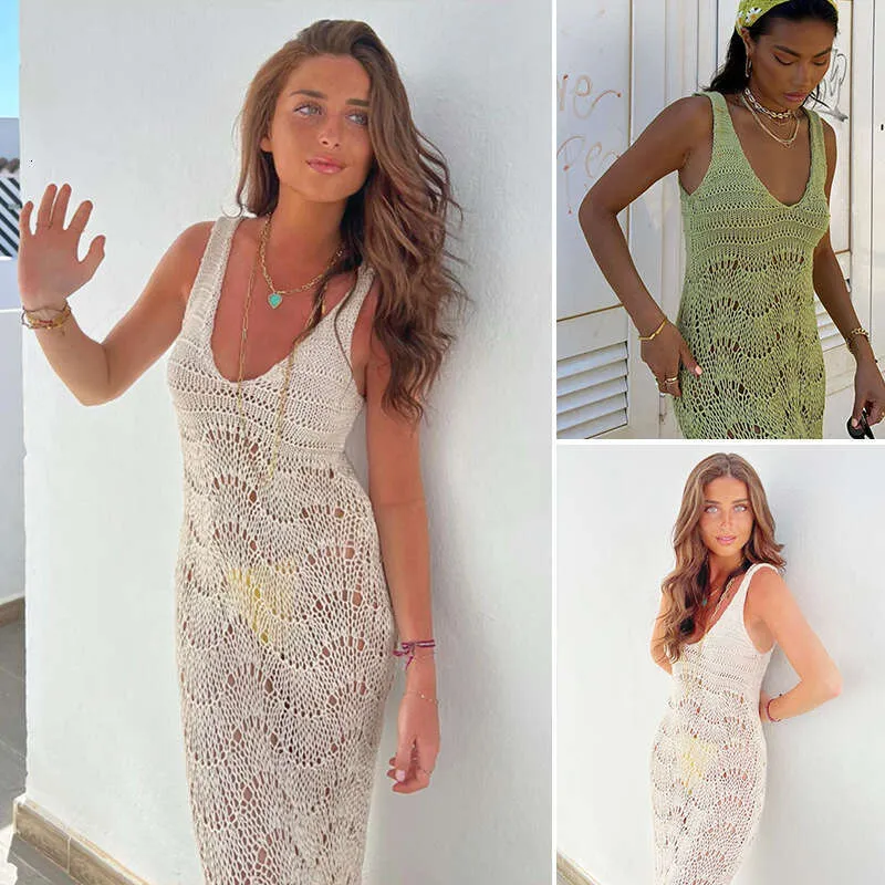 2024 New Women's Casual Fashion: Versatile Knitted Hollow Low Cut Beach White crochet dress in Solid Color, Slim Fit and Sexy Design