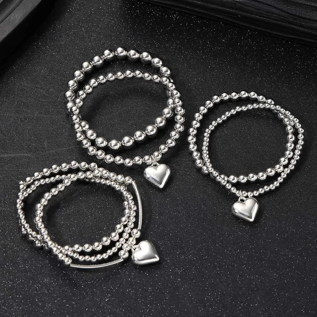 Bracciale Multicharm Sacro Cuore con Perla Bracciale Multicharm Sacro Cuore con Perla