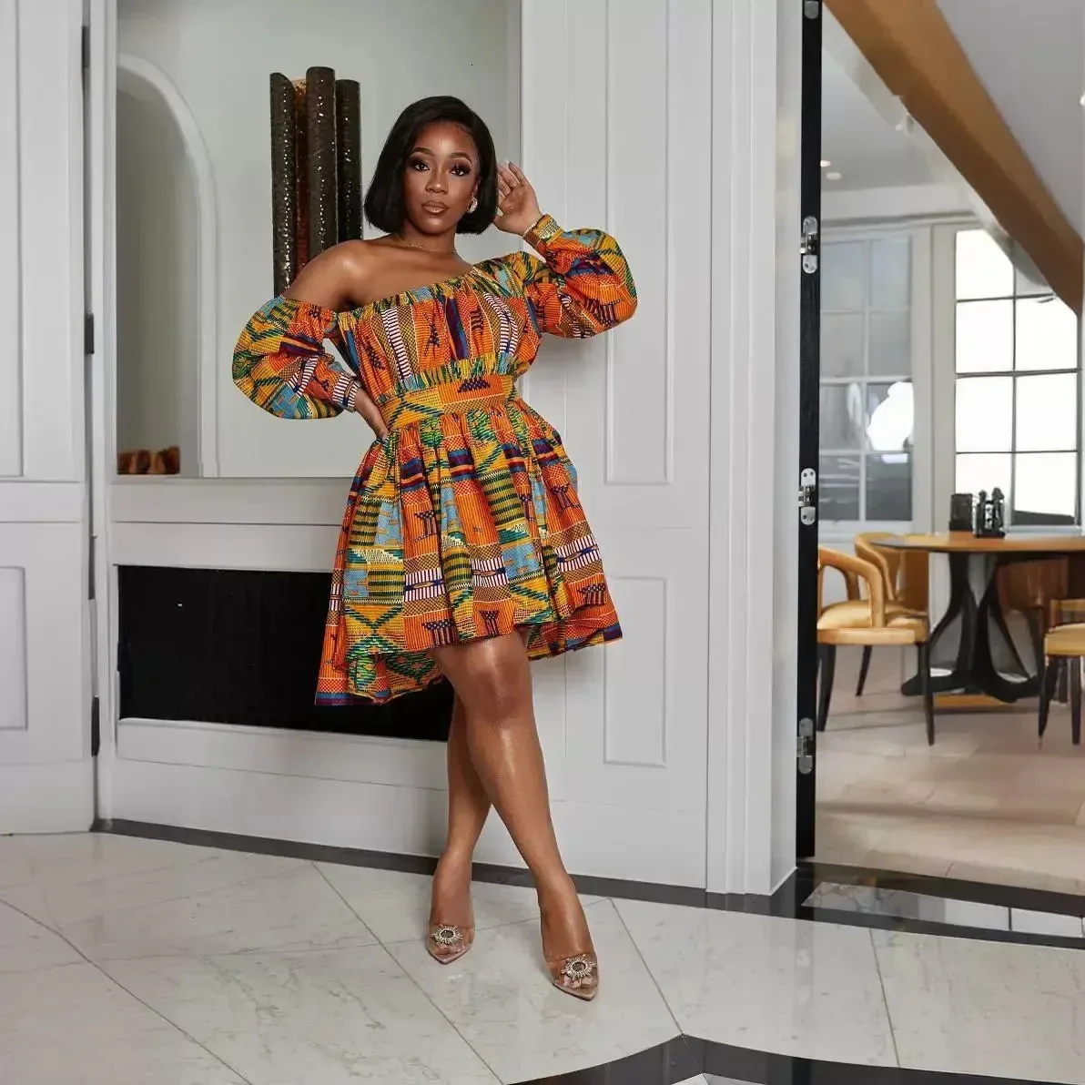 kanga designs dresses Kanga dress @kikisfashion Boutique Designer @kikizimba Location:Masaki Mwisho,Haille Selassie Rd Whatsapp +255 687 600001 Come enjoy shopping with us #kikisfashion#kikisdesign#kikizimba#africanprint#africanfashion#style# fashion#summerdress#dress