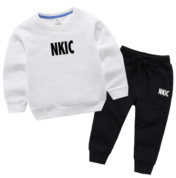 Boys white tracksuit sale