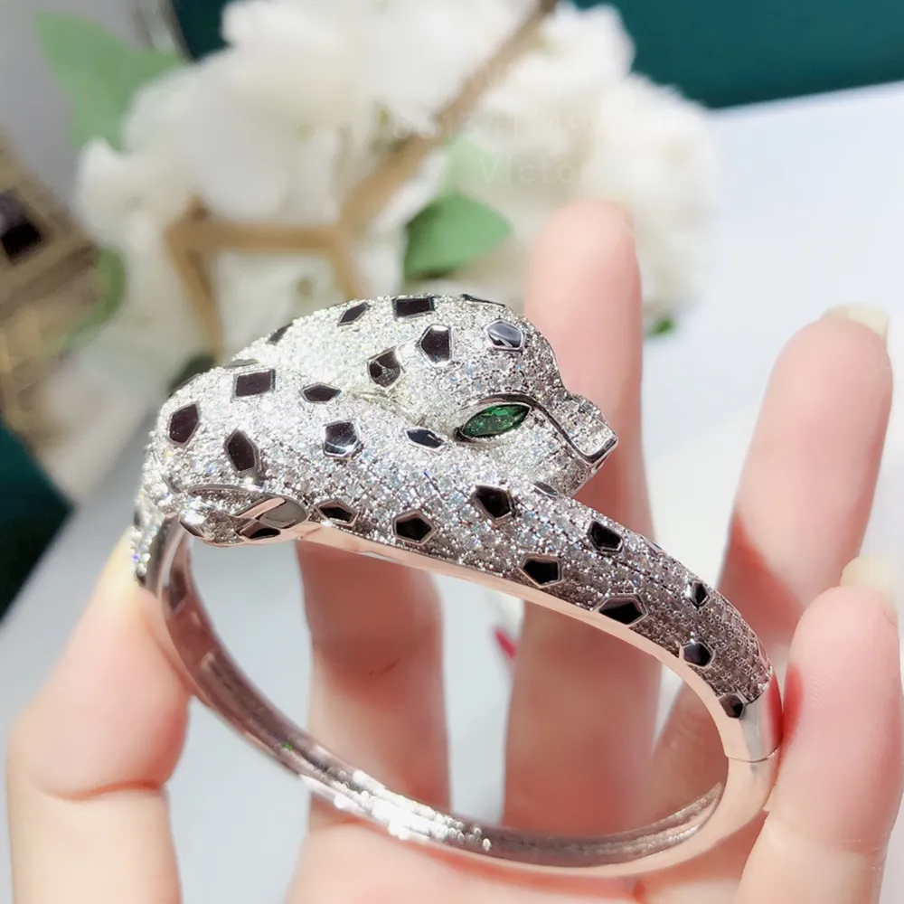 Designer Gold Plated Cathedral Charm Snake Bangle For... From ...