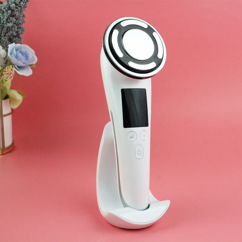 Pulse Compact Vibration massager on face with