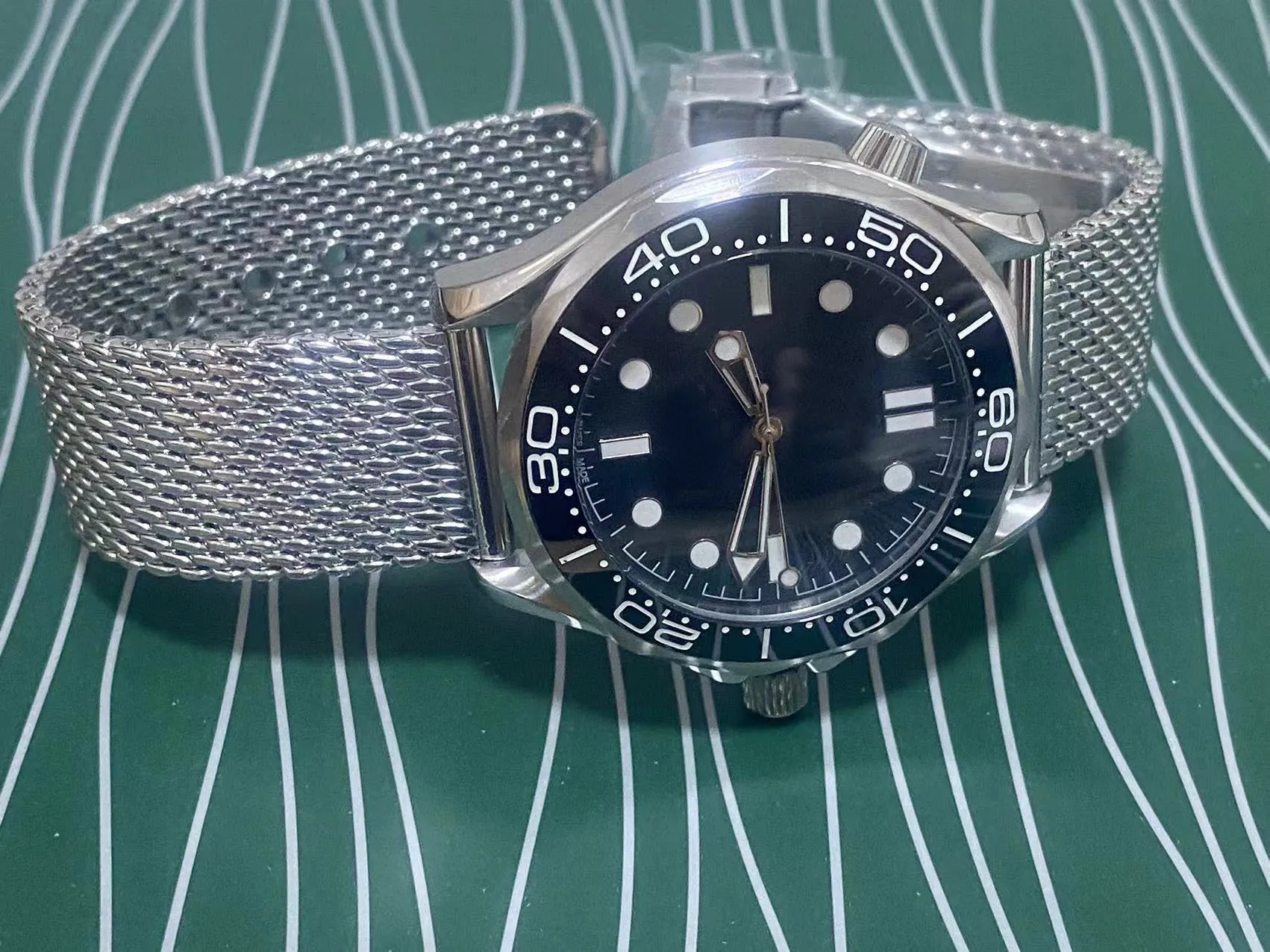High Quality Luxury Designer Men Watches For Man Luzury 007 Watch Automatic MensWatch Moonwatchs Light Up In The Dark Glow Luminous Ceramic Relojs Anniversary 60th From Oceanspring 56.99 DHgate.Com