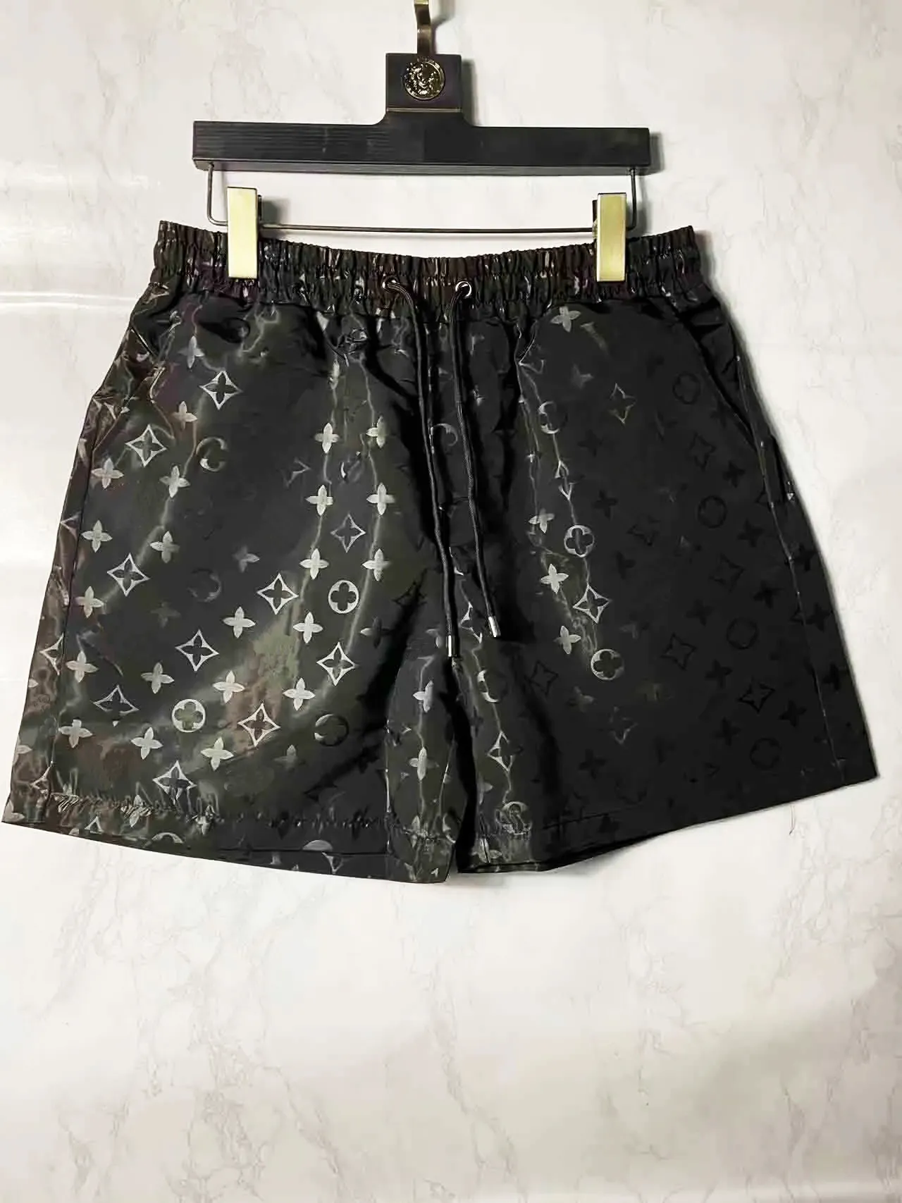 2023 Hombres Shorts Disenadores de diseno para hombres Beach Beach Batones de bano Batones de bano Swimsuits Mens Disenador Impresion informal Running