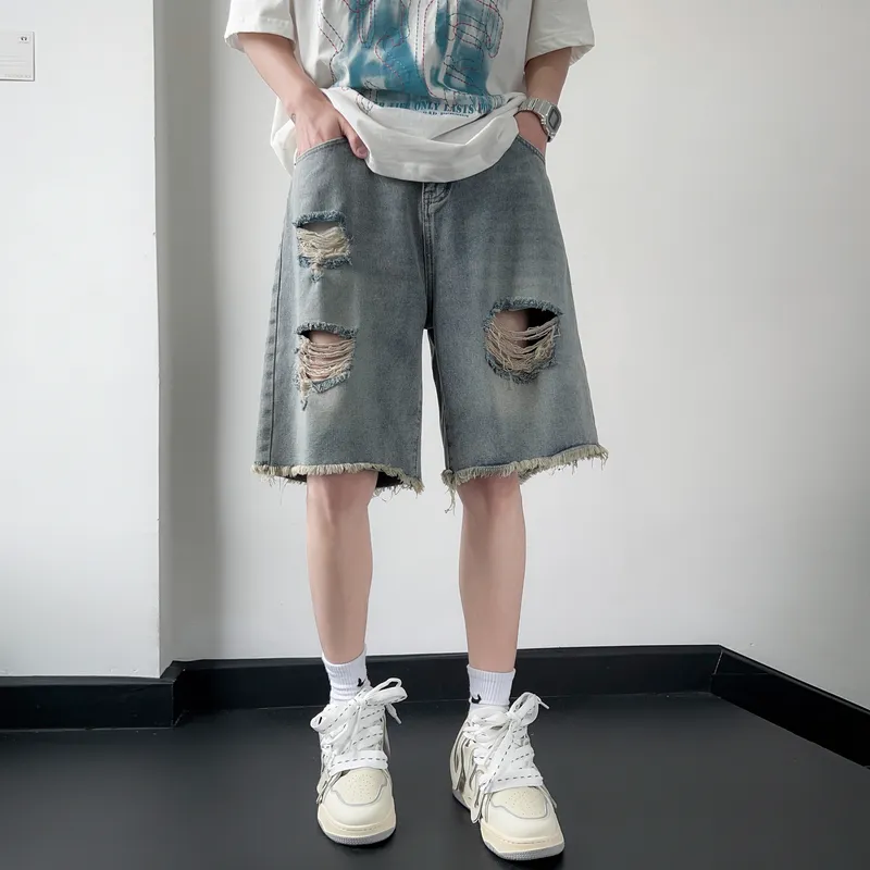 Distressed Denim Shorts With Raw Hem: Casual, Comfortable Cool