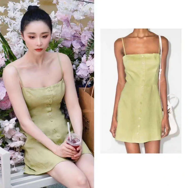 green dress with 20 buttons and a strap Women 1920s Gatsby Flapper Dress Sexy Open Back Strap Fringed Cocktail Party Dress with 20s Accessories (Green, Large) at Amazon Women's Clothing store
