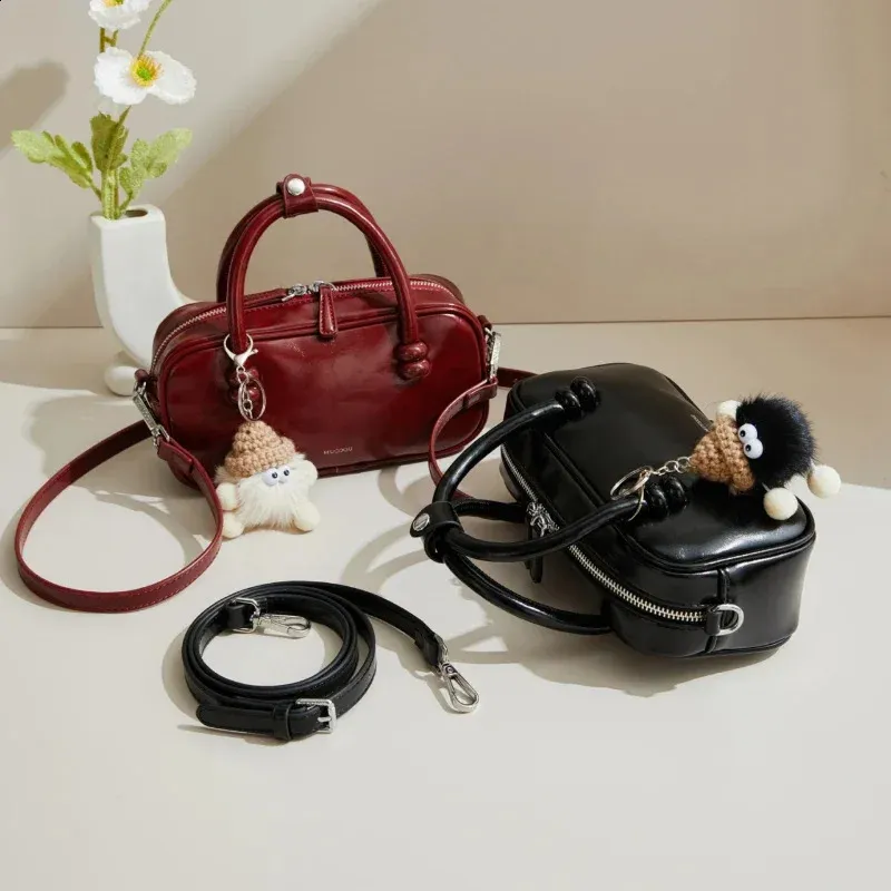 Mini Boston Bag: A Buyer's Guide to Styles, Features & Uses