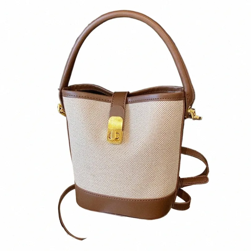 DHgate.com:Chic Canvas Bucket Bag: Large Capacity Shoulder