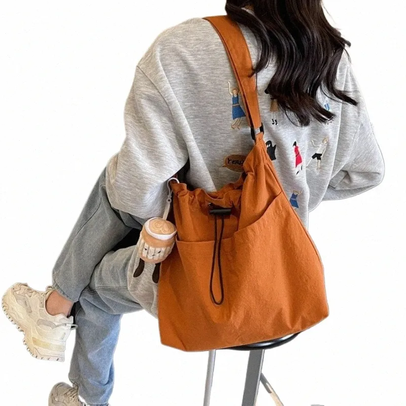 2024Nylon Water-Repellent Crossbody Bag: Durable, Lightweight