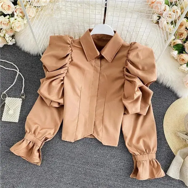 gold ruffle blouse
