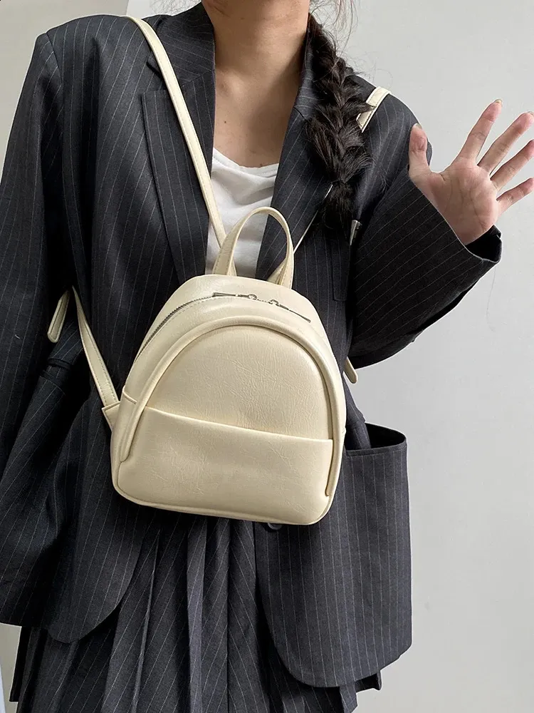 cream leather backpack mini Beige making it an ideal backup for your suitcase or hand luggage Leather Backpacks Mcm Mini Rucksack