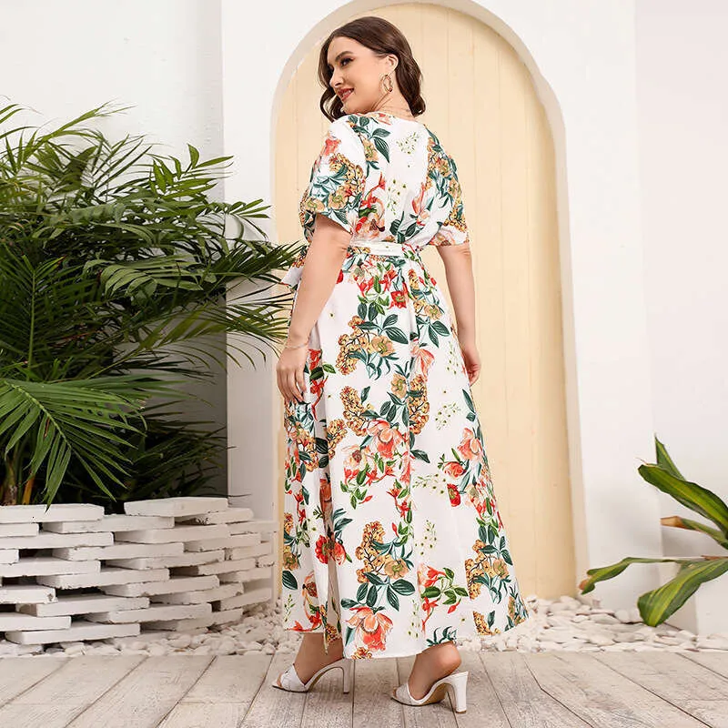Floral maxi dress with cinched waist and tie belt. Floral maxi dress with cinched waist and tie belt.