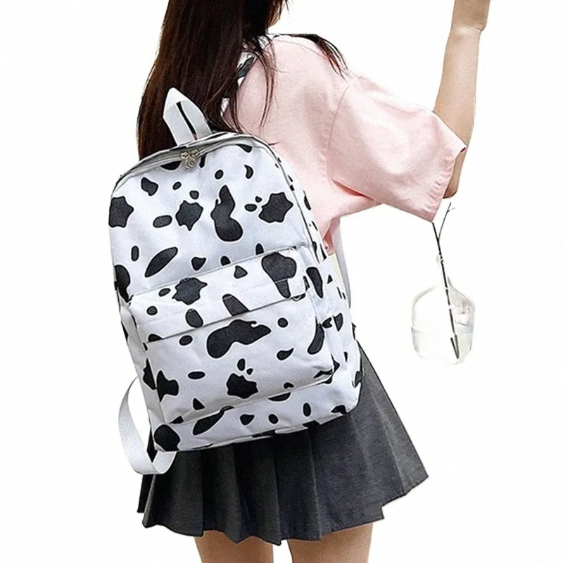 MoonTour Cow Print Backpack – Lightweight School Bag For Teens, Laptop Daypack 9 thumbnail image