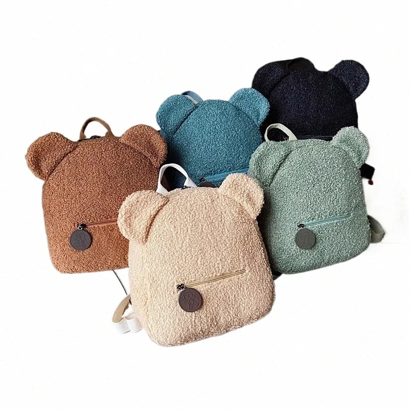 A Cute Teddy Bear Carrying A Small Backpack Is Walking Down A Dirt Road Little Its Back Long Winding Surrounded Trees Image374831153