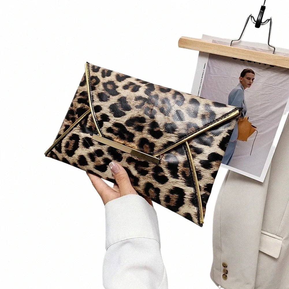Large leopard print clutch bag hotsell