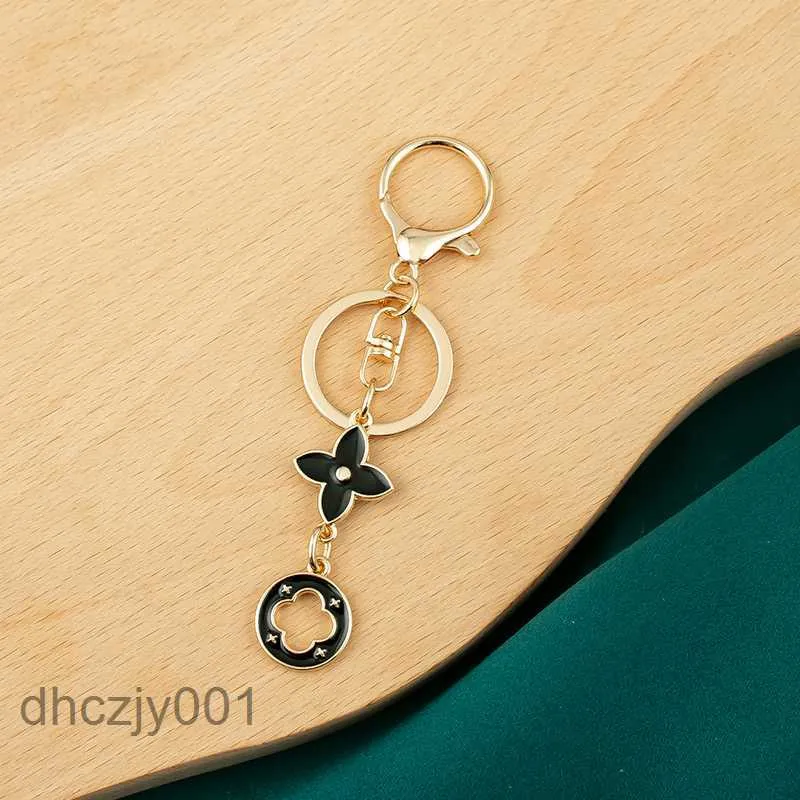 Porte-clés de styliste Twiggy, lettres dorées, mode sac pour femmes, breloque de luxe, anneaux classiques en alliage, Portachiavi C92W