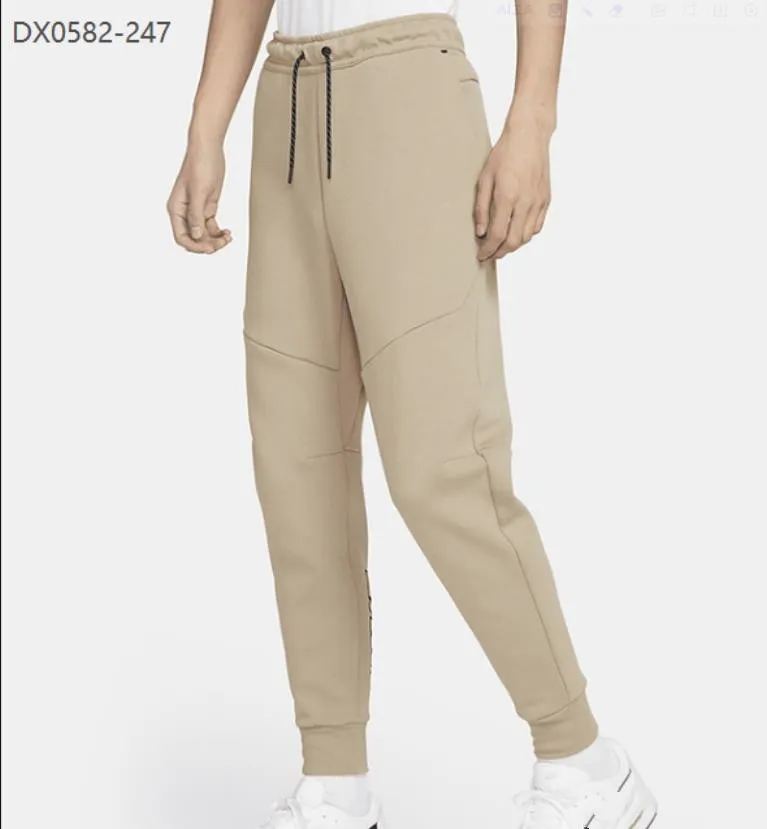 2024 La nuova marca di pantaloni sportivi da uomo in cotone spaziale Tech Fleece cerniera con colla a pressione Pantaloni per il tempo libero DX0582 S-XXL