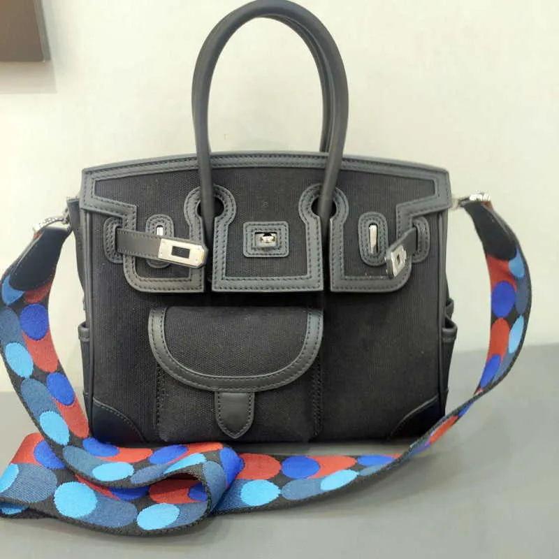 2024 nuova borsa da donna in vera pelle con inserto in tela moda tracolla a forma di onda borsa a tracolla diagonale singola portatile