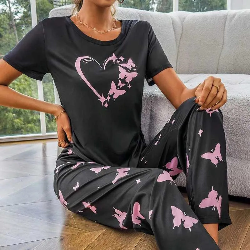 SK44 Sexig pyjamas Kvinnor Pyjamas Set Spring Autumn Milk Silk Kort ärm och långa byxor 2 -bitar Tecknad mönster Tryckt Sleepwear Pyjama Kvinna 2404101