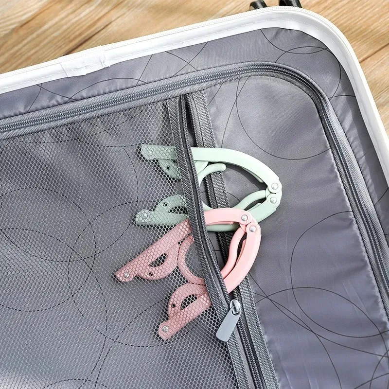 Novo 2024 Multifuncional Roupas Plástico Viagem Espaço Economizando Cabine dobrável Roupa Criativa Rack Crianças Baby Hanger1.para