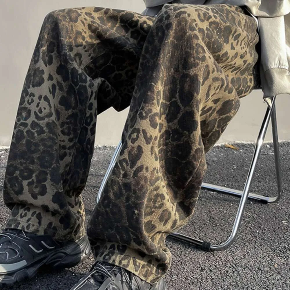 Calças jeans com estampa de leopardo de alta qualidade para homens e mulheres na primavera, nova tendência versão coreana, calças casuais elegantes e versáteis