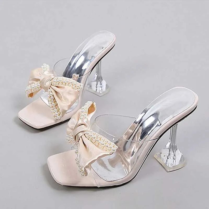 Dress Shoes 2024 New Style Women Slippers Sandals Fashion Pearl Bowknot High Heels PVC Transparent Shoes Summer le Slides Pumps H240401OA1M