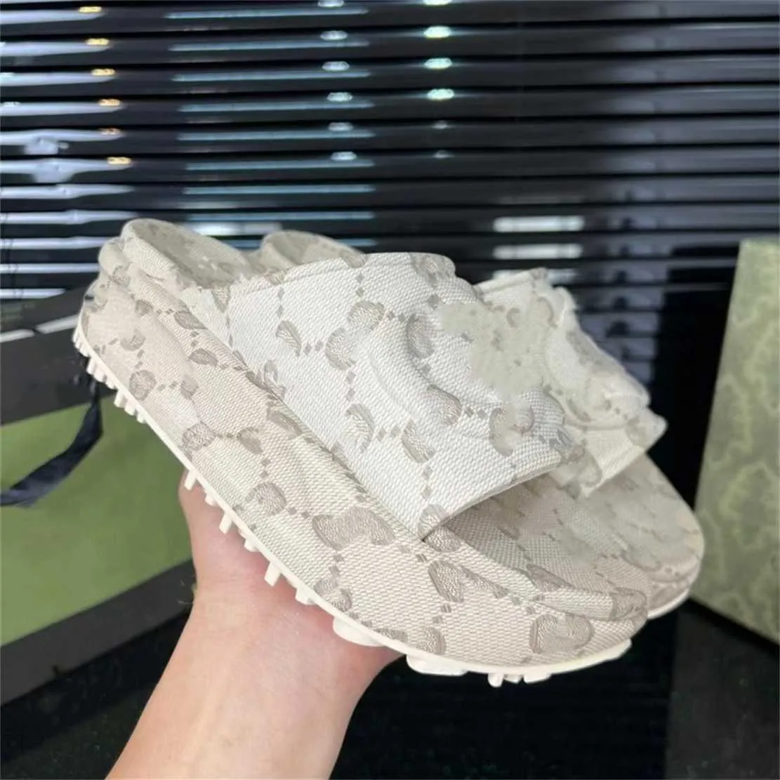 12% OFF Designer Thick sole sponge cake one line slippers women for external wear flat bottomed elevated sandals beach shoes trend