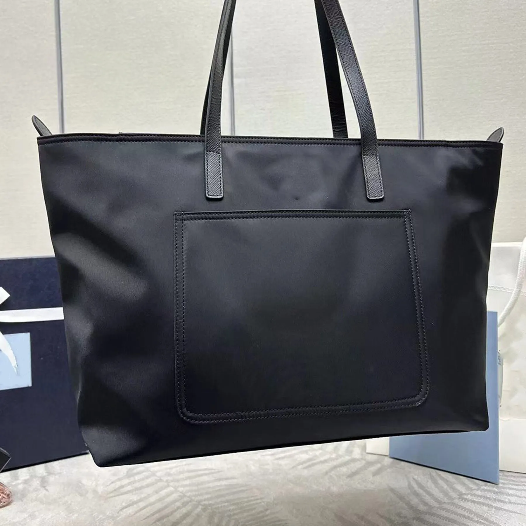 2024 Re Edition Large Nylon Tote Bag With Enameled Metal Gates Triangle Handbag Design Front Pocket Saffiano Leather And Metal Gates Hardware From Catchmybag666 211.4 DHgate.Com