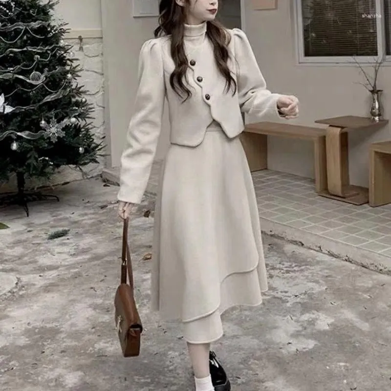 Robes de travail tempérament mode manteau de laine jupe irrégulière deux pièces ensemble dame o-cou simple boutonnage doux célébrité solide mince hiver