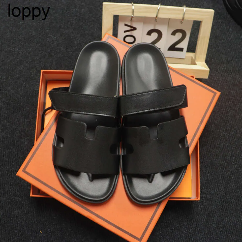 Nieuwe 24ss designer pantoffels sandalen lederen sandalen zomer modemerk winter strand platte bodem pluche heren woemns pantoffels