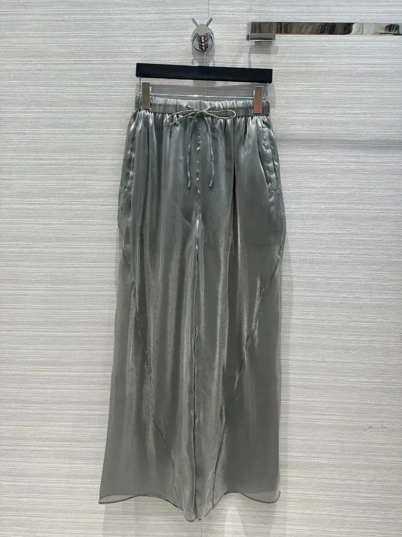 Damesbroeken Witte Fumei MOET VERGEDENDE STREADER ORGANZA Wide Leg Pants binnenkomen!Exclusieve import bloemrijke kleurrijke stof